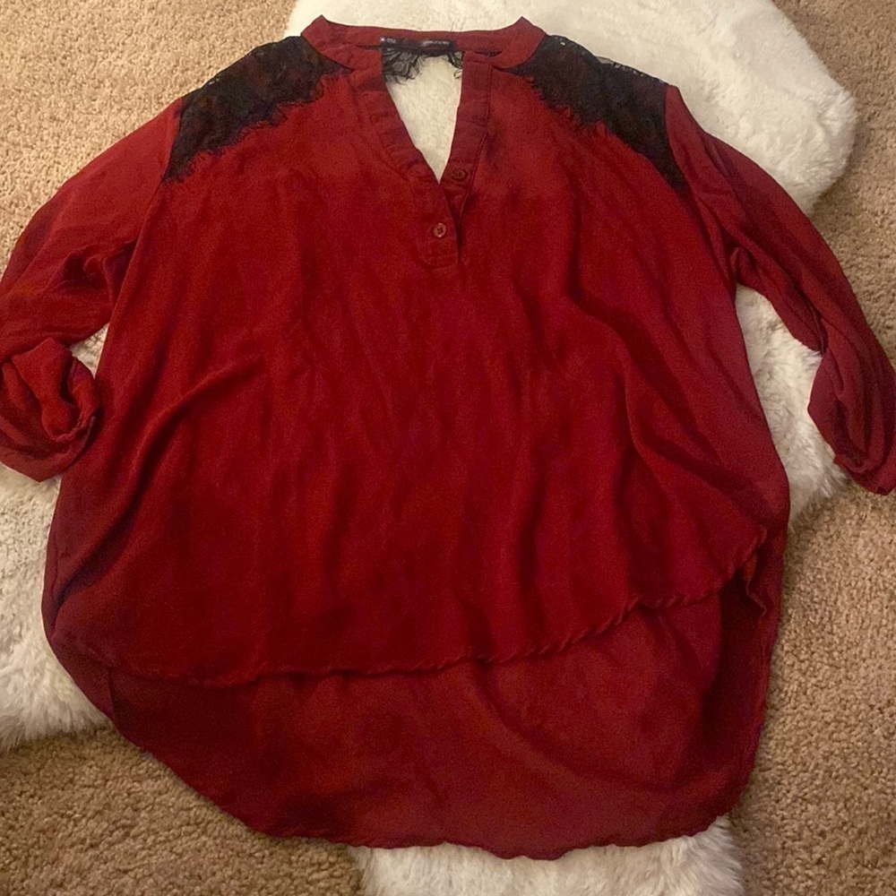 Red blouse black lace open back detail